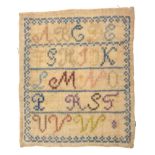 A 19th Century miniature sampler, mid 19th Century, worked with an upper case alphabet in blue,