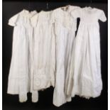 Four early 20th Century dresses etc., comprising two children's christening dresses both with