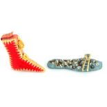 A lady's boot pin cushion and a beadwork sandal, the first in red leather with elaborate stitched