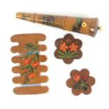 Three Spa work thread winders and a similar sewing companion, comprising two floral painted flower