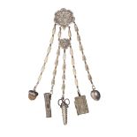 An EPNS chatelaine, the hinged clip to a cloud form mount with angel heads over a further mount with