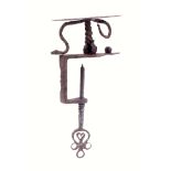 A rare late 17th Century/early 18th Century iron sewing clamp, probably French, the facet cut