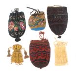 Six 19th Century bags, comprising a knitted and bead work decorated example initialled and dated '