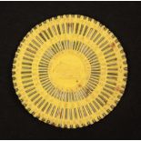 A rare Crystal Palace pin wheel, with pins in pressed yellow paper centred by a view and