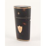 A good late 18th Century gold mounted tortoiseshell etui, of oval section and tapering form, with