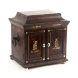 A rosewood and mother of pearl inlaid sewing/jewellery and writing cabinet, circa 1840, the front