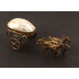 A mother of pearl pin or thimble cart, in the style of Palais Royal, the mother of pearl egg form