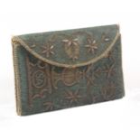 A fine early 18th Century wallet and day book, the green patterned silk ground embroidered in silver