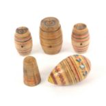 Five early paint decorated Tunbridge ware white wood sewing pieces, comprising a thimble egg with