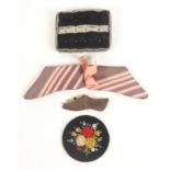 Three pin cushions and a combination pin cushion/ needle flannel, comprising a neatly stitched