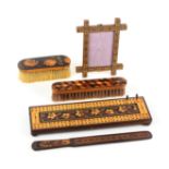 Tunbridge ware - five pieces, comprising a floral mosaic cribbage board raised on four ball feet,
