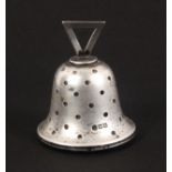 A silver pin cushion in the form of a bell, with triangular top mount, Birmingham 1907, makers