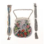 A beadwork bag and two misers purses, the beadwork bag finely worked with flowers, leaves and