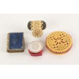 Four pin cushions, comprising an unusual pierced and shaped bone disc form example, 5cms, a small