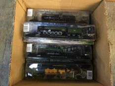 Nine boxed 'Amer Com' model trains