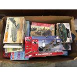 A box of Matchbox, Revell, Airfix, Mattel monogram model kits, various