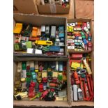 Quantity of loose Die Cast vehicles, toys etc., in four boxes