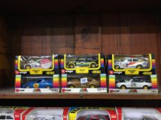 Six Burago 1:24 scale Die Cast and Decals cars, boxed