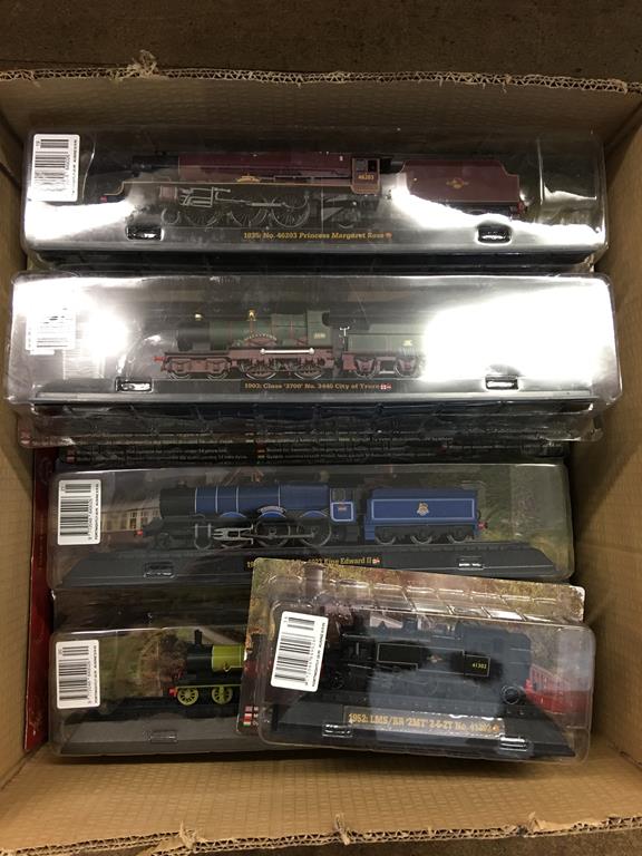 Eleven boxed 'Amer Com' model trains