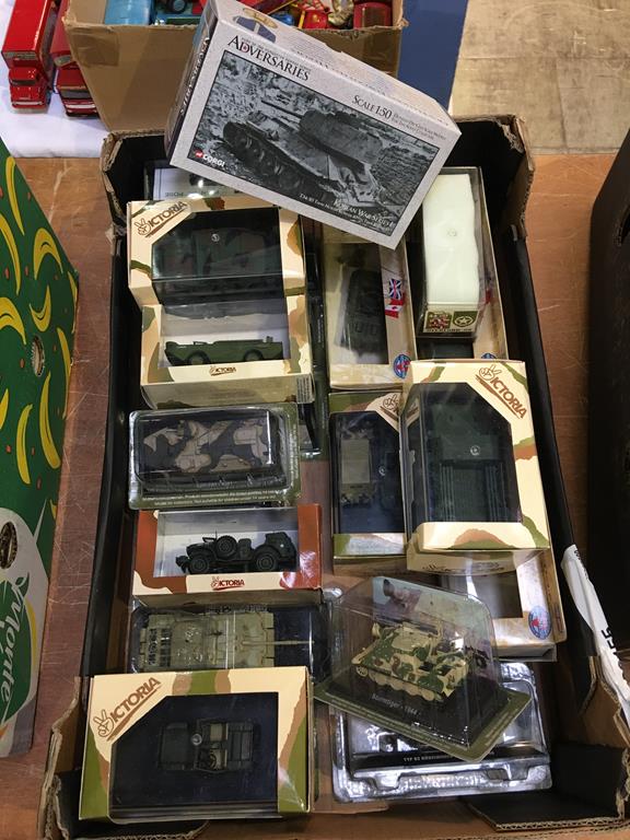 A box of twenty one Die Cast military vehicles, Corgi, Solido, Victoria etc.