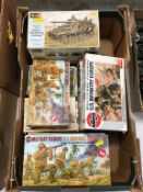 A box of model making kits to include; Airfix military figures, Matchbox and Revell etc.
