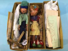 Two boxed Pelham puppets 'Greta' and 'Peter'