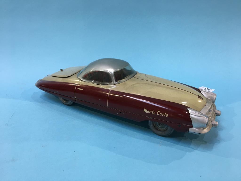 A tin plate Mettoy Monte Carlo sports car, with original detachable plastic roof, 37 cm long