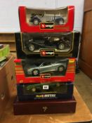 Four boxed Die Cast cars, Burago and Revell and a Limited Edition presentation case of Matchbox