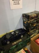 A boxed Maisto Jaguar XJ220 Die Cast model, three 1:18 scale Maisto Die Cast cars, boxed and a 1: