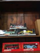 Three Ertl 1:8 scale American Muscle Die Cast cars and two 1:16 scale Tonka Polistil Die Cast