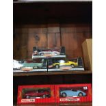 Three Ertl 1:8 scale American Muscle Die Cast cars and two 1:16 scale Tonka Polistil Die Cast