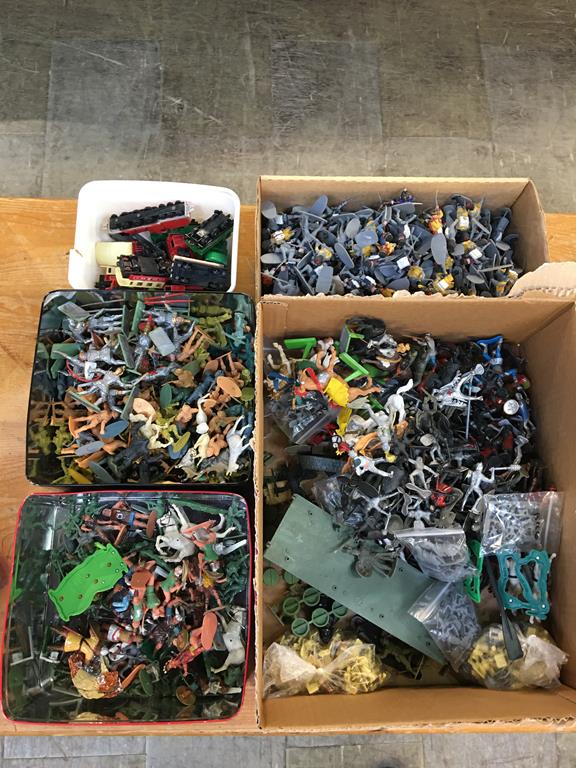 Four boxes of loose figures, plus a box of loose Matchbox trains etc. (5)