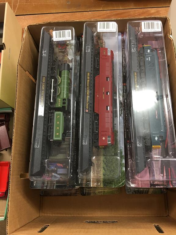 Nine boxed 'Amer Com' model trains