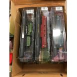 Nine boxed 'Amer Com' model trains