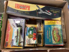 A box of assorted model making kits, planes, trains, military vehicles, figures and a Fort