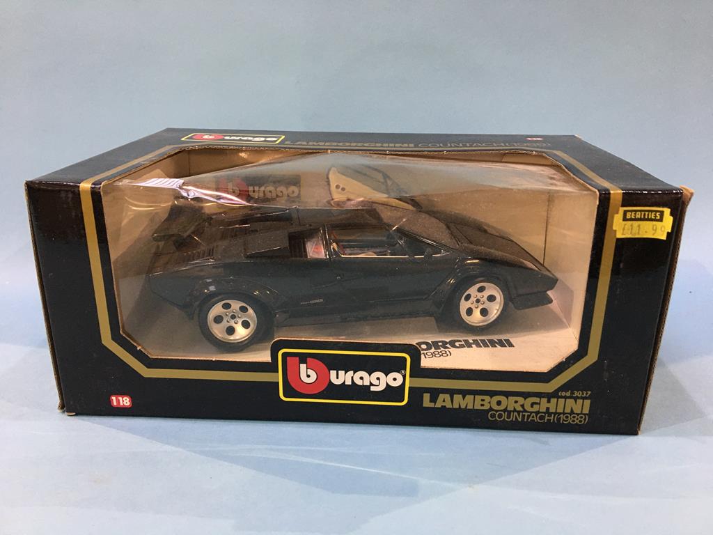 A boxed Maisto Jaguar XJ220 Die Cast model, three 1:18 scale Maisto Die Cast cars, boxed and a 1: - Image 6 of 7