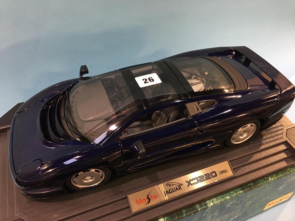 A boxed Maisto Jaguar XJ220 Die Cast model, three 1:18 scale Maisto Die Cast cars, boxed and a 1: - Image 3 of 7