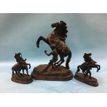 A Spelter Marley horse and a pair of smaller horses