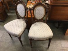 Pair of Edwardian walnut bedroom chairs