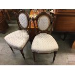 Pair of Edwardian walnut bedroom chairs