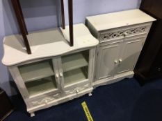 A cream painted two door glazed cabinet and a two door side cabinet