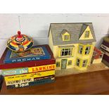 A dolls house, six vintage board games to include M-Squad, Four Just Men, High Patrol and a spinning