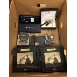 Nine boxes of Atlas miniatures 1/220, a Ben Sherman car desk clock and various watches