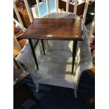 White Lloyd Loom chair and a teak table