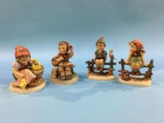 Four Hummel figures