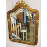 Ornate gilt mirror with ribbons and bows, 51 x 41cm