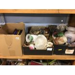 A shelf containing three boxes china and glass and nine Royal Mail special stamps