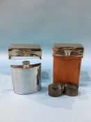 Pair of silver napkin rings, two hip flasks and a pair of plated cigarette boxes