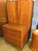 A teak double door wardrobe and chest of drawers