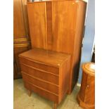 A teak double door wardrobe and chest of drawers